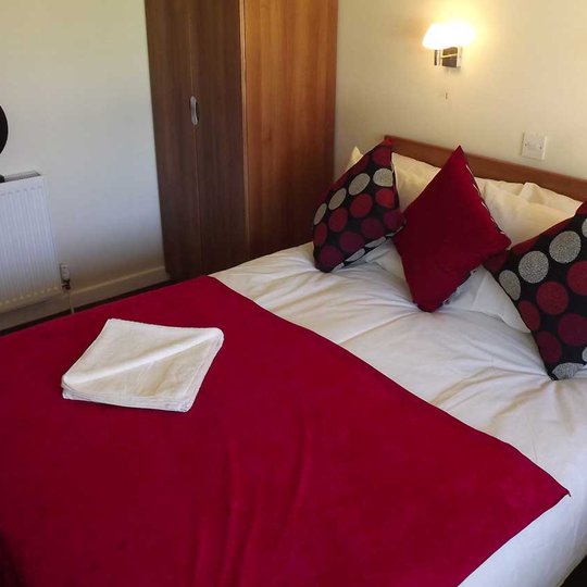 Comfortable double bed with pillows & linen included